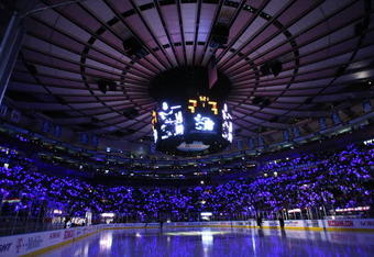 NEW YORK - APRIL 20: Fans were given glow sticks on their way into the game between the New York Rangers and the Washington Capitals for Game Three of the Eastern Conference Quarterfinal Round of the 2009 NHL Stanley Cup Playoffs at Madison Square Garden on April 20, 2009 in New York City. The Capitals defeated the Rangers 4-0. (Photo by Bruce Bennett/Getty Images)
