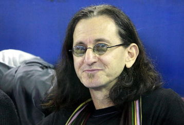 TORONTO - APRIL 4:  Geddy Lee, lead vocalist and bassist of the rock band Rush, watches as the Toronto Blue Jays play  against the Boston Red Sox for the Blue Jays' home-opener at the Rogers Centre April 4, 2008 in Toronto, Ontario, Canada.  (Photo By Dave Sandford/Getty Images)