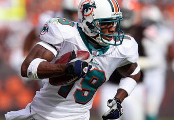 CLEVELAND - OCTOBER 14:  Ted Ginn Jr. #19 of the Miami Dolphins runs with the ball after a reception against the Cleveland Browns during the NFL game at Cleveland Browns Stadium October 14, 2007 in Cleveland, Ohio.  (Photo by Andy Lyons/Getty Images)