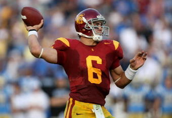 PASADENA, CA - DECEMBER 06:  Quarterback Mark Sanchez #6 of the USC Trojans throws a touchdown pass at the beginning of the third quarter against the UCLA Bruins on December 6, 2008 at the Rose Bowl in Pasadena, California.  (Photo by Stephen Dunn/Getty Images)