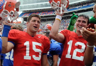 GAINESVILLE, FL - APRIL 18: Quarterbacks Tim Tebow #15 and John Brantley #12 of the University of Florida celebrate after the spring football orange and blue game April 18, 2009 at Ben Hill Griffin Stadium in Gainesville, Florida.  (Photo by Al Messerschmidt/Getty Images)