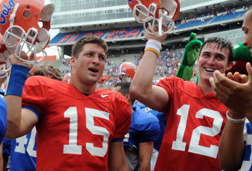 GAINESVILLE, FL - APRIL 18: Quarterbacks Tim Tebow #15 and John Brantley #12 of the University of Florida celebrate after the spring football orange and blue game April 18, 2009 at Ben Hill Griffin Stadium in Gainesville, Florida.  (Photo by Al Messerschmidt/Getty Images)