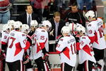 RALEIGH, NC - MARCH 25:  Coach Cory Clouston of the Ottawa Senators huddles with his team during the final minute of the third period against the Carolina Hurricanes at the RBC Center on March 25, 2009 in Raleigh, North Carolina. Carolina won 2-1. (Photo by Grant Halverson/Getty Images)