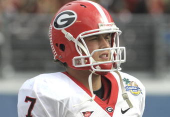 ORLANDO, FL - JANUARY 1: Quarterback Matthew Stafford #7 of the University of Georgia watches play against the Michigan State Spartans at the 2009 Capital One Bowl at the Citrus Bowl on January 1, 2009 in Orlando, Florida.  (Photo by Al Messerschmidt/Getty Images) 
