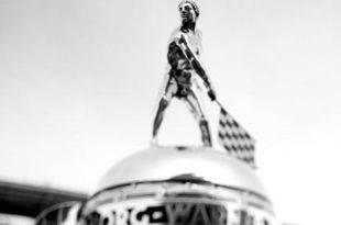INDIANAPOLIS - MAY 25:  (EDITORS NOTE: A TILT-SHIFT LENS WAS USED TO MAKE THE PICTURE, THIS DIGITAL IMAGE HAS BEEN CONVERTED TO BLACK AND WHITE) The Borg-Warner Trophy sits on pit lane before the start of the IndyCar Series 92nd running of the Indianapolis 500 at Indianapolis Motor Speedway on May 25, 2008 in Indianapolis, Indiana.  (Photo by Jonathan Ferrey/Getty Images)