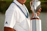 AVONDALE, LA - MARCH 30:  Andres Romero holds the winner's trophy after the final round of the Zurich Classic of New Orleans on March 30, 2008 at TPC Louisiana in Avondale, Louisiana.  Romero finished the day at 13 under-par.  (Photo by Chris Graythen/Getty Images)