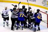 ST LOUIS, MO - APRIL 19:  Members of the St Louis Blues and the Vancouver Canucks fight in the first period during Game Three of the Western Conference Quarterfinal Round of the 2009 Stanley Cup Playoffs on April 19, 2009 at Scottrade Center in St. Louis, Missouri. (Photo by Matthew Stockman/Getty Images)