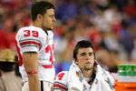 GLENDALE, AZ - JANUARY 08:  Michael Dougherty #39 and Grant Schwartz #24 of the Ohio State Buckeyes react during the finals seconds of the game before losing 41-14 to the Florida Gators during the 2007 Tostitos BCS National Championship Game at the University of Phoenix Stadium on January 8, 2007 in Glendale, Arizona.  The Gators defeated the Buckeyes 41-14.    (Photo by Doug Pensinger/Getty Images)