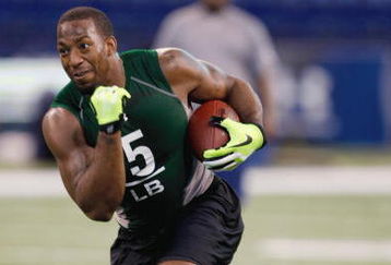 INDIANAPOLIS, IN - FEBRUARY 23:  Linebacker Aaron Curry of Wake Forset runs with the football during the NFL Scouting Combine presented by Under Armour at Lucas Oil Stadium on February 23, 2009 in Indianapolis, Indiana. (Photo by Scott Boehm/Getty Images)