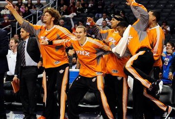 LOS ANGELES, CA - FEBRUARY 18:  Phoenix Suns bench celebrates as Shaquille O'Neal #32 of the Suns drives up the court after blocking Al Thornthon's #12 Los Angeles Clippers shot during the second quarter at the Staples Center February 18, 2009, in Los Angeles, California. NOTE TO USER: User expressly acknowledges and agrees that, by downloading and or using this photograph, User is consenting to the terms and conditions of the Getty Images License Agreement.  (Photo by Kevork Djansezian/Getty Images)