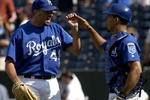 KANSAS CITY, MO - AUGUST 22:  Closer Jeremy Affeldt #48  (L) and catcher Alberto Castillo #45 of the Kansas City Royals celebrate their win over the Texas Rangers August 22, 2004 at Kauffman Stadium in Kansas City, Missouri. The Royals won 10-2 to end the Ranger's eight-game winning streak. (Photo by Dave Kaup/Getty Images)