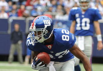 EAST RUTHERFORD, NJ - OCTOBER 05:  Mario Manningham #82 of the New York Giants plays against the Seattle Seahawks during their game on October 5, 2008 at Giants Stadium in East Rutherford, New Jersey.  (Photo by Al Bello/Getty Images)