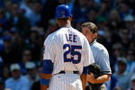 CHICAGO, IL - SEPTEMBER 18: First baseman Derrek Lee #25  of the Chicago Cubs argues with home plate umpire Ed Rapuano #19 after a called strike against the Milwaukee Brewers at the Wrigley Field on September 18, 2008 in Chicago, Illinois. (Photo by Scott Boehm/Getty Images)