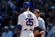 CHICAGO, IL - SEPTEMBER 18: First baseman Derrek Lee #25  of the Chicago Cubs argues with home plate umpire Ed Rapuano #19 after a called strike against the Milwaukee Brewers at the Wrigley Field on September 18, 2008 in Chicago, Illinois. (Photo by Scott Boehm/Getty Images)