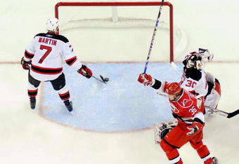 RALEIGH, NC - APRIL 21:  Jussi Jokinen #36 of the Carolina Hurricanes celebrates after scoring the game-winning goal against Martin Brodeur #30 of the New Jersey Devils during Game Four of the Eastern Conference Quarterfinals of the 2009 Stanley Cup Playoffs on April 21, 2009 at the RBC Center in Raleigh, North Carolina.  (Photo by Grant Halverson/Getty Images)