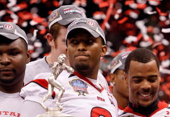 NEW ORLEANS - JANUARY 02:  (L-R) Quarterback Brian Johnson #3 and wide receiver Brent Casteel #5 of the Utah Utes celebrate after defeating the Alabama Crimson Tide 31-17 during the 75th Allstate Sugar Bowl at the Louisiana Superdome on January 2, 2009 in New Orleans, Louisiana.  (Photo by Chris Graythen/Getty Images)