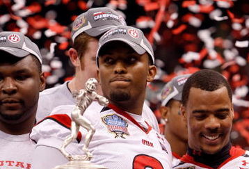 NEW ORLEANS - JANUARY 02:  (L-R) Quarterback Brian Johnson #3 and wide receiver Brent Casteel #5 of the Utah Utes celebrate after defeating the Alabama Crimson Tide 31-17 during the 75th Allstate Sugar Bowl at the Louisiana Superdome on January 2, 2009 in New Orleans, Louisiana.  (Photo by Chris Graythen/Getty Images)