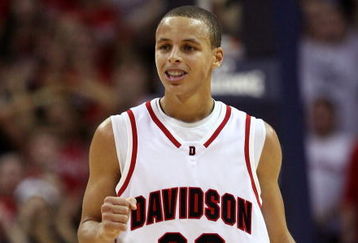 CHARLOTTE, NC - DECEMBER 06:  Stephen Curry #30 of the Davidson Wildcats reacts to his team's 72-67 victory over the North Carolina State Wolfpack during their game at Time Warner Cable Arena on December 6, 2008 in Charlotte, North Carolina.  (Photo by Streeter Lecka/Getty Images)
