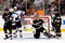 ANAHEIM, CA - APRIL 21:  Referee Mike Hasenfratz signals a goal as Dan Boyle #22 and Milan Michalek #9 of the San Jose Sharks celebrate Boyle's goal in the second period while Sheldon Brookbank #21 and goaltender Jonas Hiller #1 of the Anaheim Ducks look on during Game Three of the Western Conference Quarterfinal Round of the 2009 Stanley Cup Playoffs at Honda Center on April 21, 2009 in Anaheim, California.  (Photo by Harry How/Getty Images)