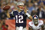 GLENDALE, AZ - FEBRUARY 03:  Quarterback Tom Brady #12 of the New England Patriots drops back to pass against the New York Giants the second half of Super Bowl XLII on February 3, 2008 at the University of Phoenix Stadium in Glendale, Arizona. The Giants defeated the Patriots 17-14.  (Photo by Donald Miralle/Getty Images)