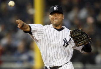 NEW YORK - APRIL 21: Derek Jeter #2 of the New York Yankees throws to first base against the Oakland Athletics at Yankee Stadium April 21, 2009 in the Bronx borough of New York City.  (Photo by Nick Laham/Getty Images)