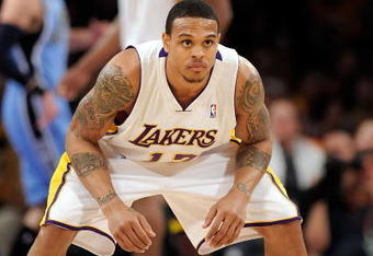 LOS ANGELES, CA - APRIL 19:  Shannon Brown #12 of the Los Angeles Lakers looks on while taking on the Utah Jazz in Game One of the Western Conference Quarterfinals during the 2009 NBA Playoffs at Staples Center on April 19, 2009 in Los Angeles, California. NOTE TO USER: User expressly acknowledges and agrees that, by downloading and or using this photograph, User is consenting to the terms and conditions of the Getty Images License Agreement.  (Photo by Kevork Djansezian/Getty Images)