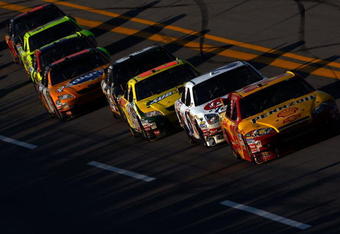 TALLADEGA, AL - OCTOBER 05:  Kevin Harvick, driver of the #29 Shell/Pennzoil Chevrolet, leads a group of cars during the NASCAR Sprint Cup Series Amp Energy 500 at Talladega Superspeedway on October 5, 2008 in Talladega, AL.  (Photo by Chris Graythen/Getty Images)