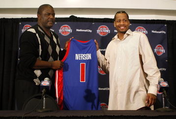 AUBURN HILLS, MI - NOVEMBER 04:  Allen Iverson #1 of the Detroit Pistons is introduced at press conference by President of Basketball Operations Joe Dumars after being traded from the Denver Nuggets on November 4, 2008 at the Palace of Auburn Hills in Auburn Hills, Michigan. NOTE TO USER: User expressly acknowledges and agrees that, by downloading and or using this photograph, User is consenting to the terms and conditions of the Getty Images License Agreement.  (Photo by Gregory Shamus/Getty Images)
