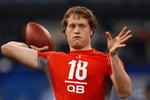 INDIANAPOLIS, IN - FEBRUARY 22:  Quarterback Matthew Stafford of USC passes the football during the NFL Scouting Combine presented by Under Armour at Lucas Oil Stadium on February 22, 2009 in Indianapolis, Indiana. (Photo by Scott Boehm/Getty Images)