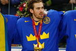 TURIN, ITALY - FEBRUARY 26:  Members of team Sweden stands with their gold medals after defeating Finland 3-2 in the final of the men's ice hockey match between Finland and Sweden during Day 16 of the Turin 2006 Winter Olympic Games on February 26, 2006 at the Palasport Olimpico in Turin, Italy.  (Photo by Al Bello/Getty Images)