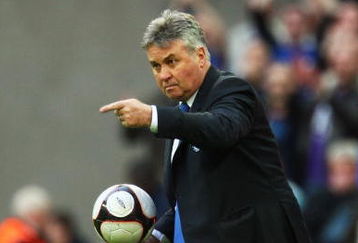 LONDON - APRIL 18:  Chelsea Manager Guus Hiddink gestures during the FA Cup sponsored by E.ON Semi Final match between Arsenal and Chelsea at Wembley Stadium on April 18, 2009 in London, England.  (Photo by Phil Cole/Getty Images)