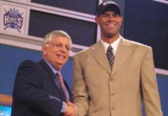 27 Jun 2001:  NBA Commisioner David Stern congratulates Shane Battier of Duke on becoming the sixth pick in the NBA Draft by the Vancouver Grzzies at the Theatre in Madison Square Garden in New York City. Mandatory Credit: Al Bello/ALLSPORT NOTE TO USER: It is expressly understood that the only rights Allsport are offering to license in this Photograph are one-time, non-exclusive editorial rights. No advertising or commercial uses of any kind may be made of Allsport photos.  User acknowledges that it is aware that Allsport is an editorial sports agency and that NO RELEASES OF ANY TYPE ARE OBTAINED from the subjects contained in the photographs.