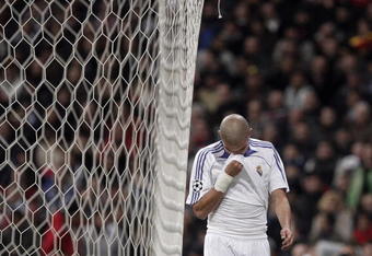 MADRID, SPAIN - MARCH 05:  Pepe of Real Madrid reacts as he trudges off the pitch after receiving a red card during the UEFA Champions League first knockout round second leg match between Real Madrid and AS Roma at the Santiago Bernabeu Stadium on March 5, 2008 in Madrid, Spain. Real Madrid lost their match 2-1.  (Photo by Jasper Juinen/Getty Images)