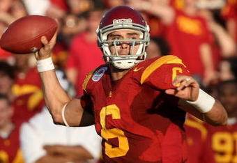 PASADENA, CA - JANUARY 01:  Quarterback Mark Sanchez #6 of the USC Trojans throws a touchdown at the end of the first half against the Penn State Nittany Lions during the 95th Rose Bowl Game presented by Citi on January 1, 2009 at the Rose Bowl in Pasadena, California.  (Photo by Stephen Dunn/Getty Images)