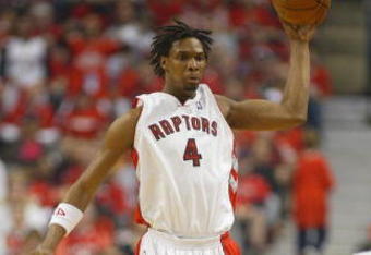 TORONTO, ON - APRIL 26:  Chris Bosh #4 of the Toronto Raptors picks up a rebound against the Orlando Magic in Game Four of the Eastern Conference Quarterfinals at the Air Canada Centre April 26, 2008 in Toronto, Ontario. The Magic defeated the Raptors 106-94 to take a 3-1 series lead.  (Photo by Claus Andersen/Getty Images)