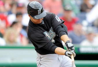 WASHINGTON - APRIL 19:  Cody Ross #12 of the Florida Marlins hits a single in the sixth inning against the Washington Nationals at Nationals Park on April 19, 2009 in Washington, DC.  (Photo by Greg Fiume/Getty Images)