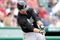WASHINGTON - APRIL 19:  Cody Ross #12 of the Florida Marlins hits a single in the sixth inning against the Washington Nationals at Nationals Park on April 19, 2009 in Washington, DC.  (Photo by Greg Fiume/Getty Images)