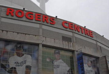 TORONTO - APRIL 6:  The C.N. Tower stands above Rogers Centre prior to the Detorit Tigers taking on Toronto Blue Jays during their Opening Day game April 6, 2009 in Toronto, Ontario, Canada. (Photo By A.J. Messier/Getty Images)