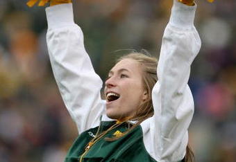 GREEN BAY, WI - NOVEMBER 16:  A Green Bay Packers cheerleader supports her team against the Chicago Bears during NFL action at Lambeau Field on November 16, 2008 in Green Bay, Wisconsin. The Packers defeated the Bears 37-3.  (Photo by Doug Pensinger/Getty Images)