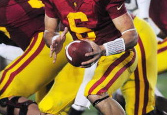PASADENA, CA - JANUARY 01: Quarterback Mark Sanchez #6 of the USC Trojans to hand the ball off during the 95th Rose Bowl Game presented by Citi against the Penn State Nittany Lions at the Rose Bowl on January 1, 2009 in Pasadena, California. The Trojans defeated the Nittany Lions 38-24. (Photo by Matt Kincaid/Getty Images) 
