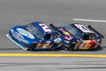 TALLADEGA, AL - OCTOBER 05: Kurt Busch driver of the #2 Miller Lite Dodge leads Brian Vickers driver of the #83 Red Bull Toyota during the NASCAR Sprint Cup Series Amp Energy 500 at Talladega Superspeedway on October 5, 2008 in Talladega, AL.  (Photo by John Harrelson/Getty Images for NASCAR)