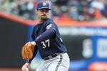 NEW YORK - APRIL 19:  Jeff Suppan #37 of the Milwaukee Brewers pitches against the New York Mets at Citi Field on April 19, 2009 in the Flushing neighborhood of the Queens borough of New York City.  (Photo by Nick Laham/Getty Images)