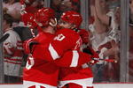DETROIT - APRIL 18:  Henrik Zetterberg #40 of the Detroit Red Wings celebrates a second period gaol with Johan Franzen #93 while playiny the Columbus Blue Jackets during Game Two of the Western Conference Quarterfinals of the 2009 NHL Stanley Cup Playoffs on April 18, 2009 at Joe Louis Arena in Detroit, Michigan.  (Photo by Gregory Shamus/Getty Images)