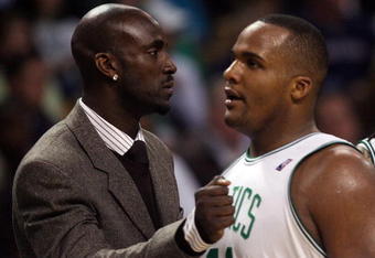 BOSTON - APRIL 20:  Kevin Garnett #5 of the Boston Celtics congratulates Glen Davis #11 in the second half against the Chicago Bulls in Game Two of the Eastern Conference Quarterfinals during the 2009 NBA Playoffs at TD Banknorth Garden on April 20, 2009 in Boston, Massachusetts. The Boston Celtics defeated the Chicago Bulls 118-115. NOTE TO USER: User expressly acknowledges and agrees that, by downloading and or using this photograph, User is consenting to the terms and conditions of the Getty Images License Agreement. (Photo by Elsa/Getty Images)