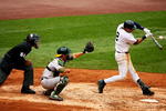 NEW YORK - APRIL 22:  Derek Jeter #2 of the New York Yankees hits the ball against the Oakland Athletics during their game on April 22, 2009 at Yankee Stadium in the Bronx borough of New York City.  (Photo by Al Bello/Getty Images)