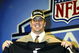 NEW YORK - APRIL 24:  Robert Gallery holds up his Oakland Raiders jersey during the 2004 NFL Draft on April 24, 2004 at Madison Square Garden in New York City. Gallery was selected second overall by the Oakland Raiders.  (Photo by Chris Trotman/Getty Images)