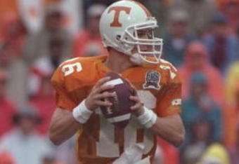 21 Sep 1996:  Quarterback Peyton Manning of the Tennessee Volunteers looks down field for an open receiver as he drops back to pass during a play in the Volunteers 35-29 loss to the Florida Gators at Neyland Stadium in Knoxville, Tennessee.  Mandatory Cre