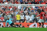 LONDON, ENGLAND - APRIL 19:  Tim Howard of Everton saves a penalty from Dimitar Berbatov of Manchester United in the shoot out during the FA Cup sponsored by E.ON Semi Final match between Everton and Manchester United at Wembley Stadium on April 19, 2009 in London, England.  (Photo by Shaun Botterill/Getty Images)