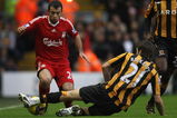 LIVERPOOL, UNITED KINGDOM - DECEMBER 13:  Javier Mascherano of Liverpool is challenged by Sam Ricketts of Hull City during the Barclays Premier League match between Liverpool and Hull City at Anfield on December 13, 2008 in Liverpool, England. (Photo by Hamish Blair/Getty Images)