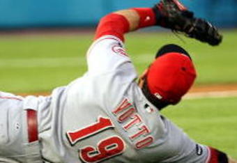 MIAMI - JUNE 07:  First Baseman Joey Votto #19 of the Cincinnati Reds cannot make the play in the fourth inning against the Florida Marlins at Dolphin Stadium June 7, 2008 in Miami, Florida.  (Photo by Marc Serota/Getty Images)